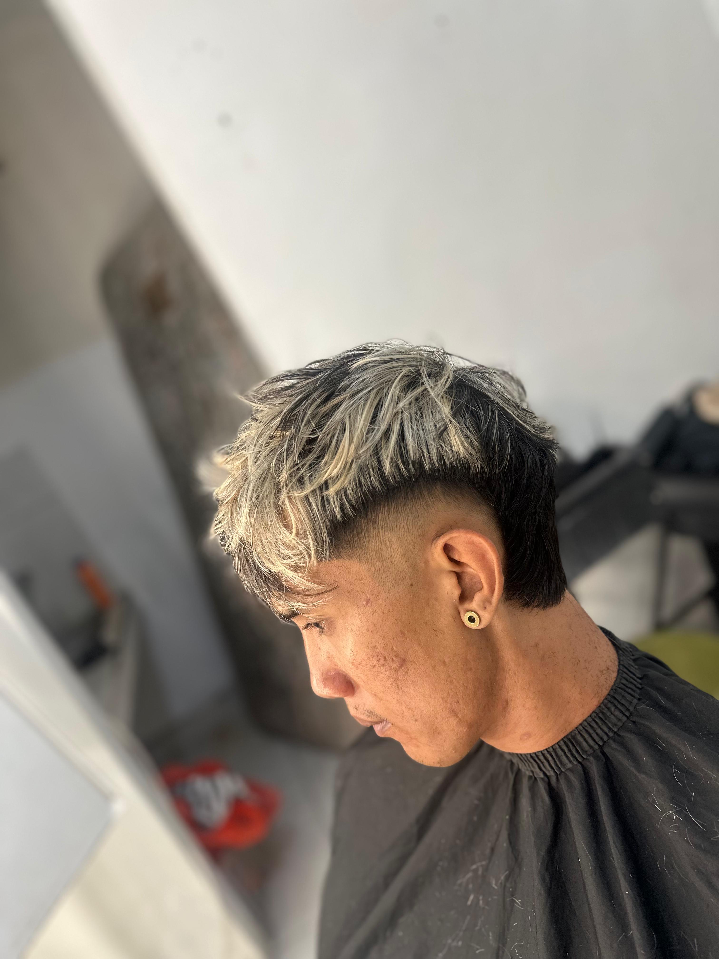 Finished styled haircut result on client